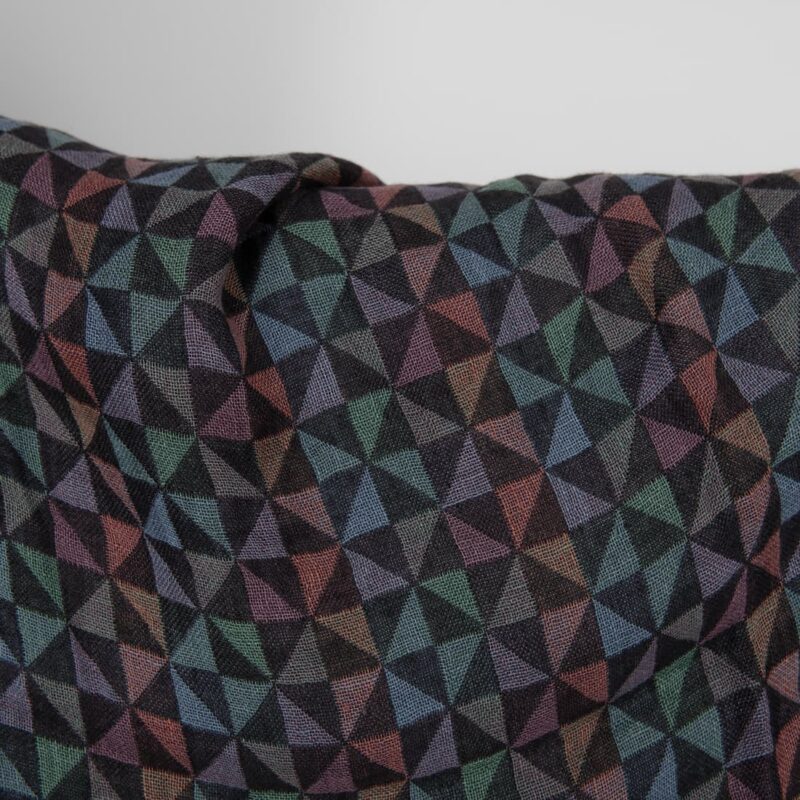 Washed linen fabric black with multicolour triangles close up detail