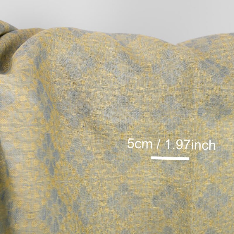 Linen fabric in light blue and yellow floral jacquard, 5cm pattern