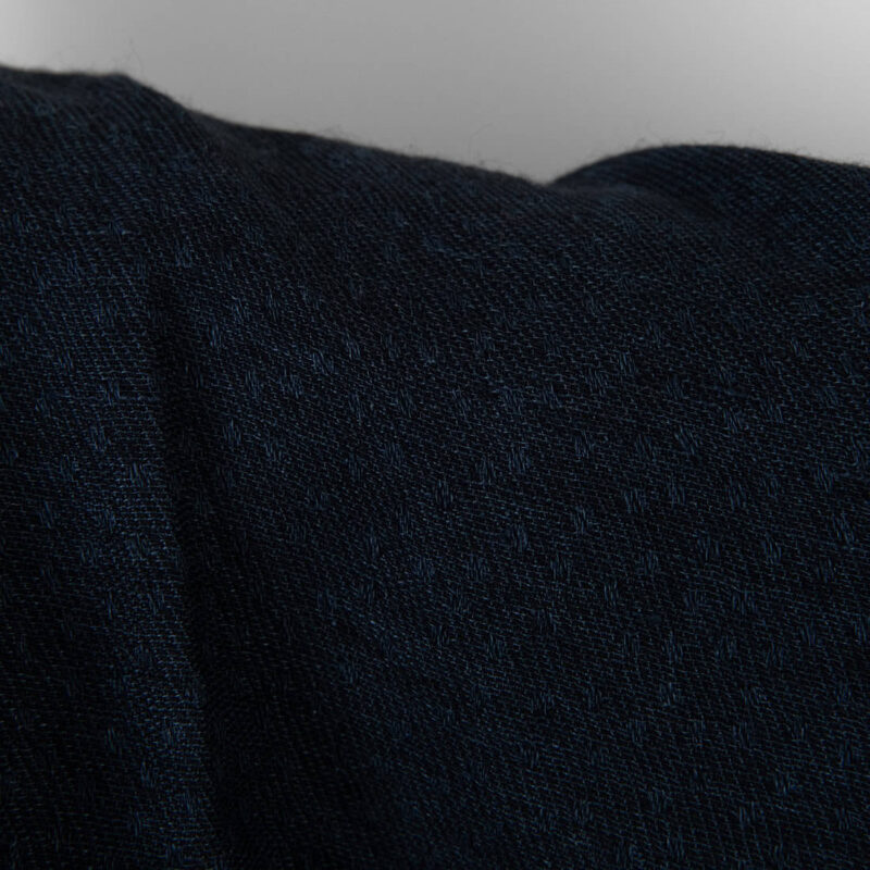 Washed linen wool fabric black with dark blue dots, 140cm