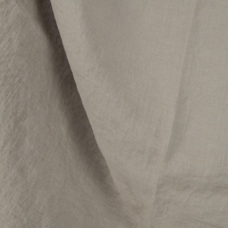 Washed linen fabric cool grey beige colour close up detail