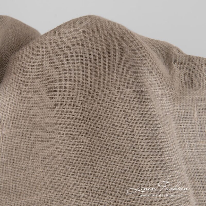 Linen fabric woven from undyed yarns