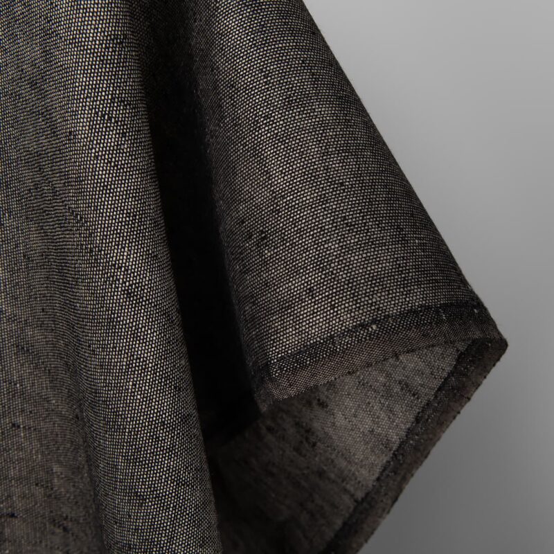 Linen fabric in natural and black pattern, fabric edge