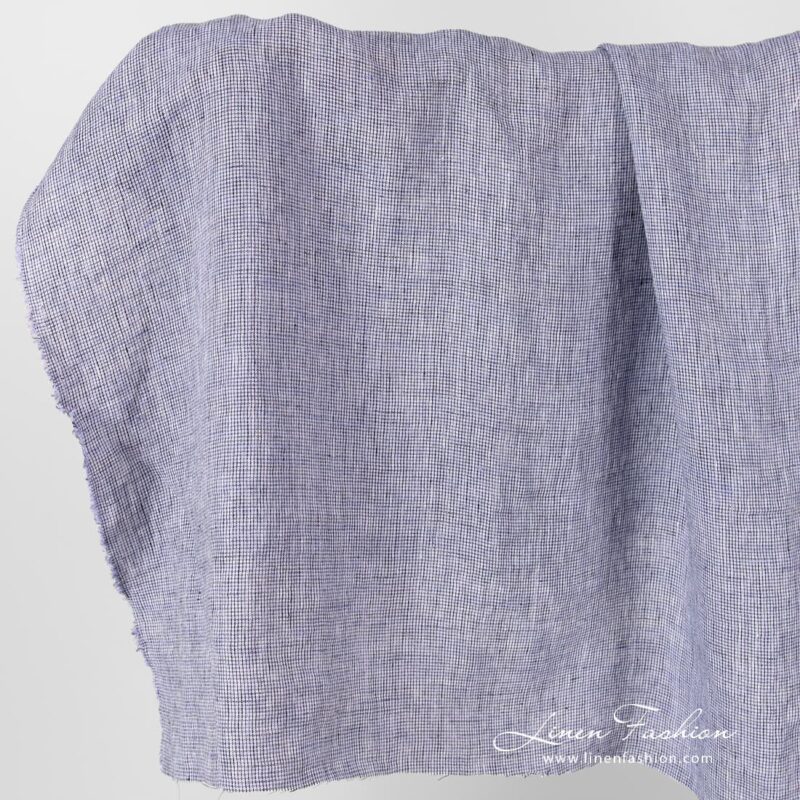 Linen fabric in black violet checks, washed.