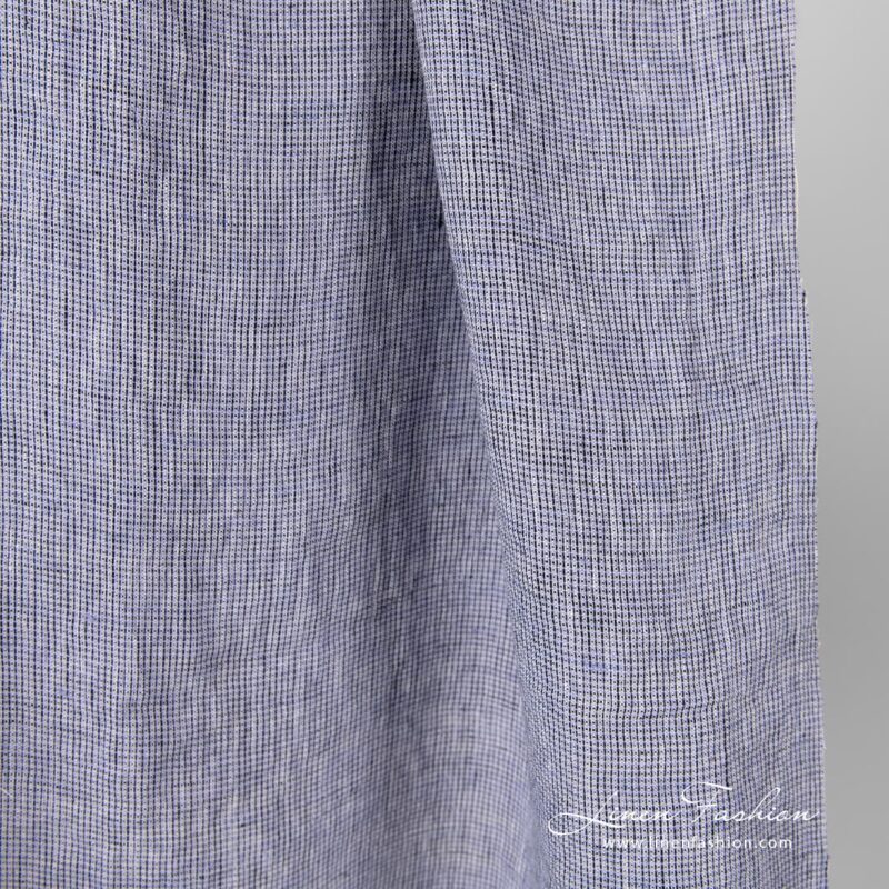 Washed 100% linen fabric in black violet checks.