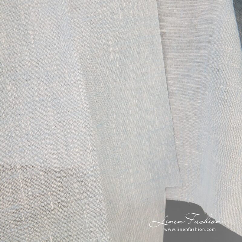 Linen fabric woven from white and blue yarns