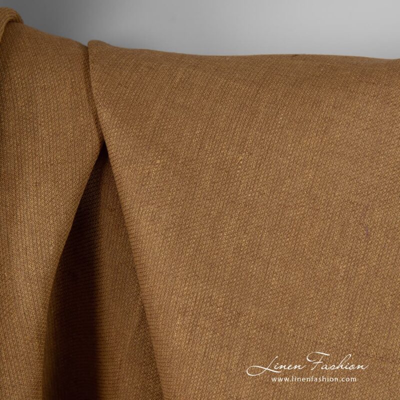 Linen fabric in brown melange colour.