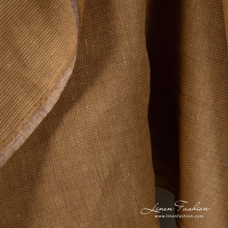 Patterned 100% linen fabric in brown melange.