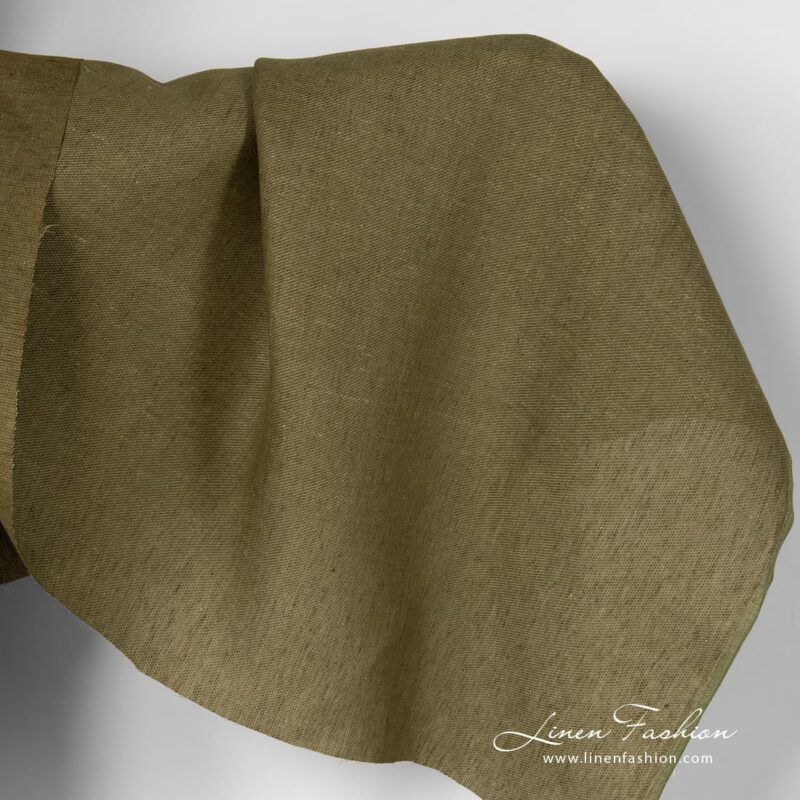 Moss green linen fabric in diagonal pattern.