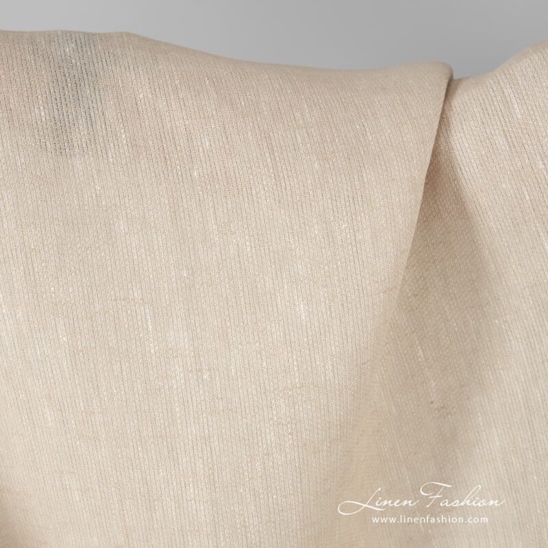 Linen fabric in light sand colour.