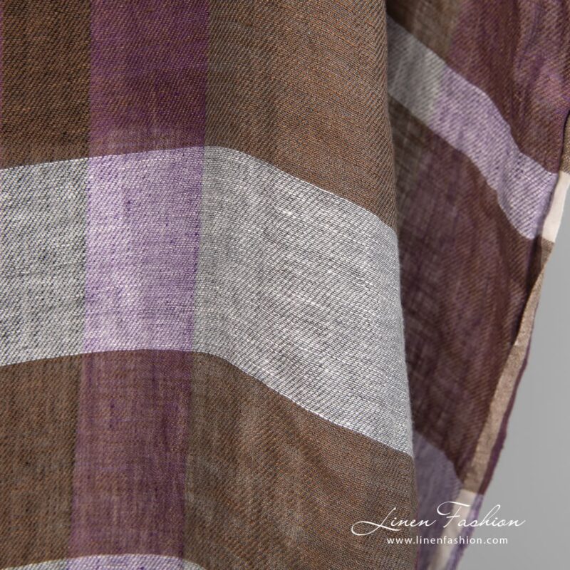 Linen fabric in wide stripes woven from violet, grey, black, yellow and brown yarns