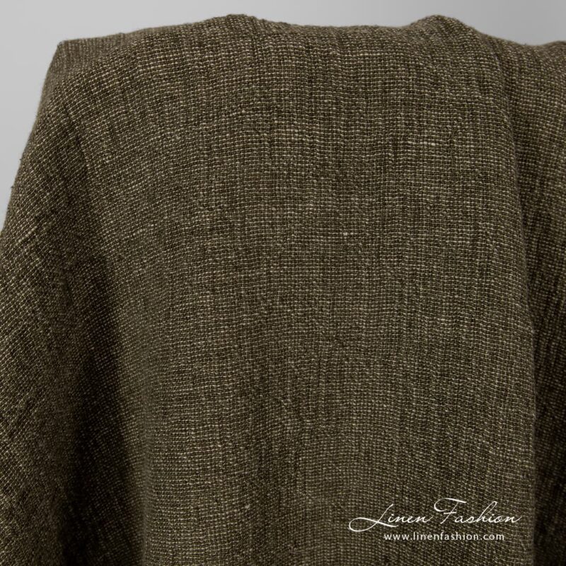 Washed linen fabric in moss green.