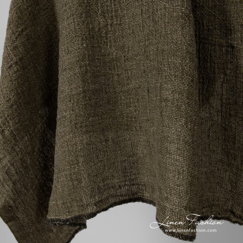 100% linen fabric in moss green, washed.