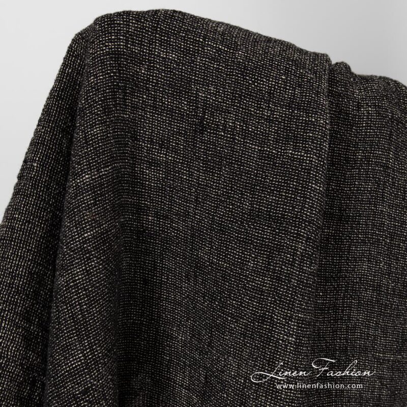 Washed linen fabric in black and flax melange.