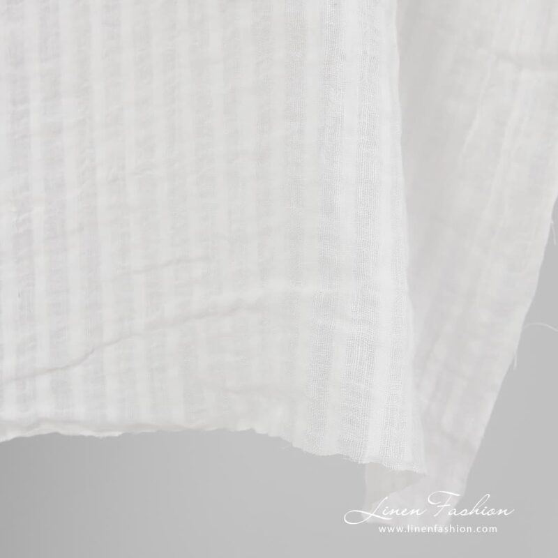Striped 100% linen fabric in off white colour.