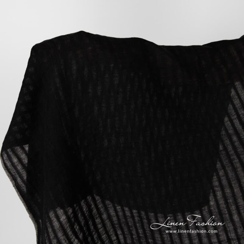 Washed black striped linen fabric.