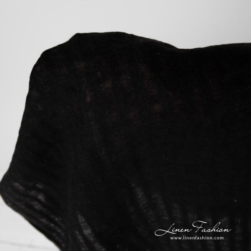Striped black linen fabric.