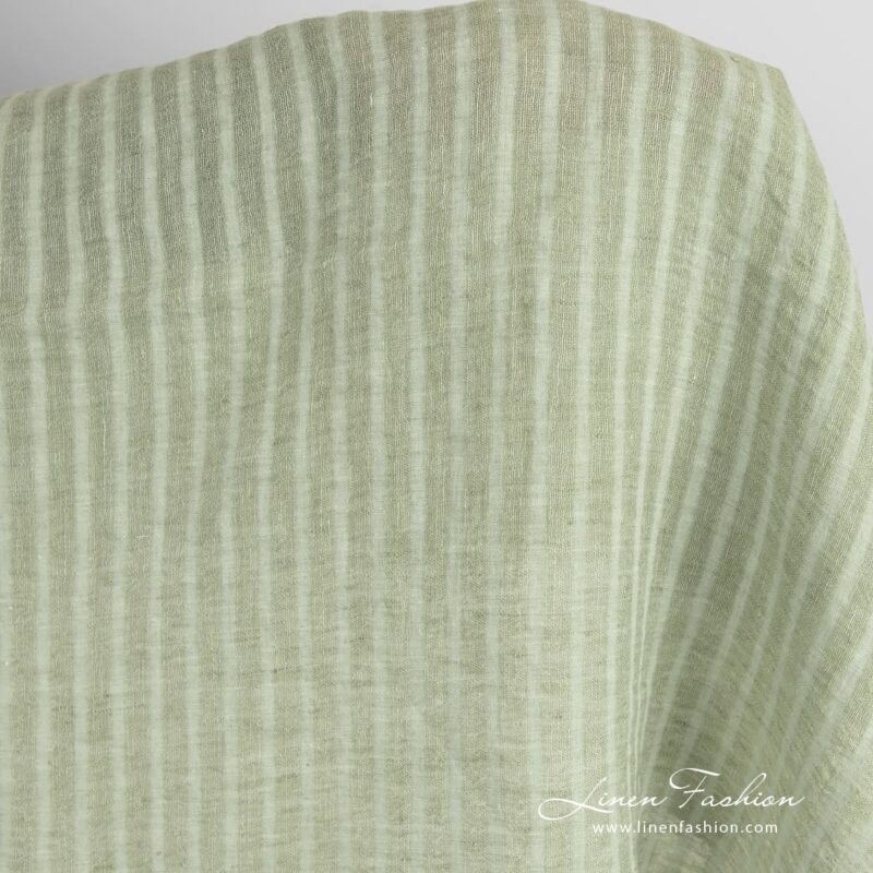 Green linen fabric in transparent stripes
