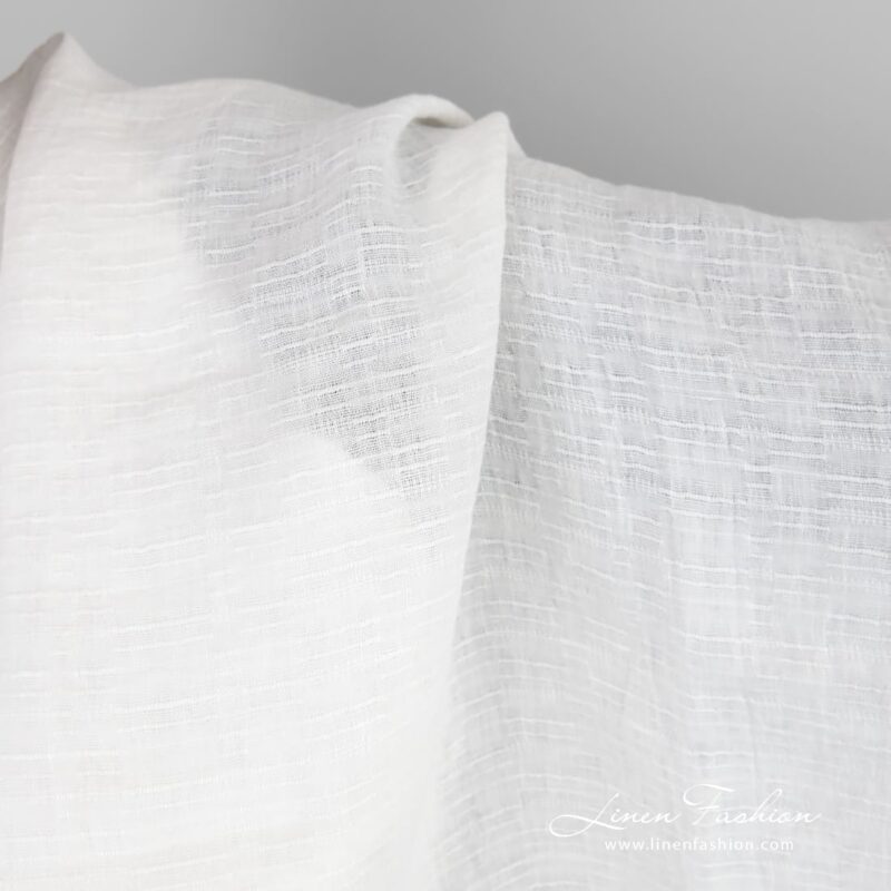 White linen fabric in horizontal stripes