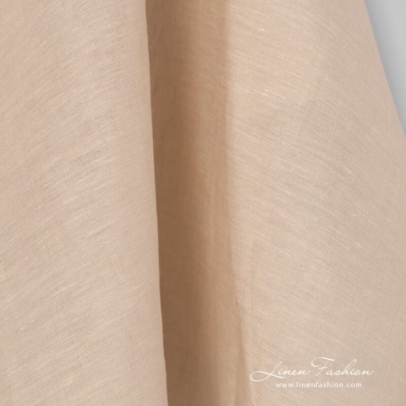 Cream melange dyed linen fabric.