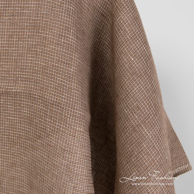 Waffle checked linen fabric in brown colour.