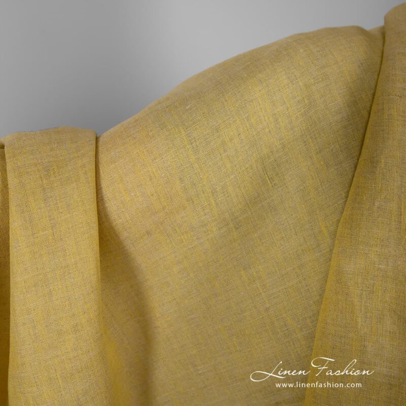 Yellow melange linen fabric.