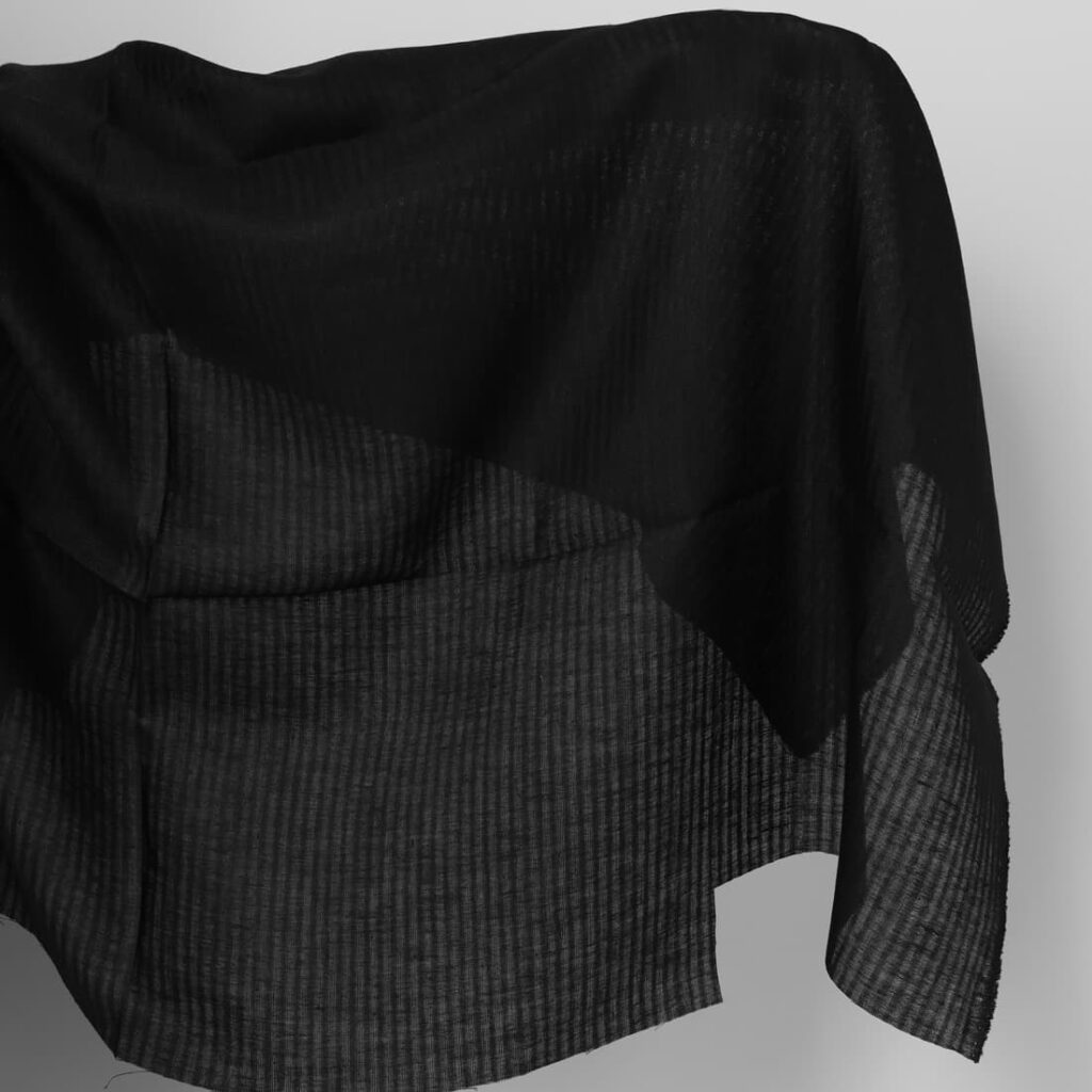 Sheer linen fabric in black stripes