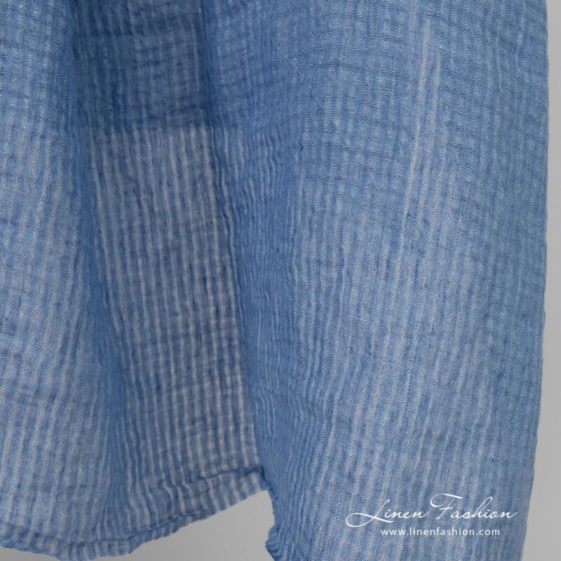 Blue openweave linen fabric in tiny transparent checks