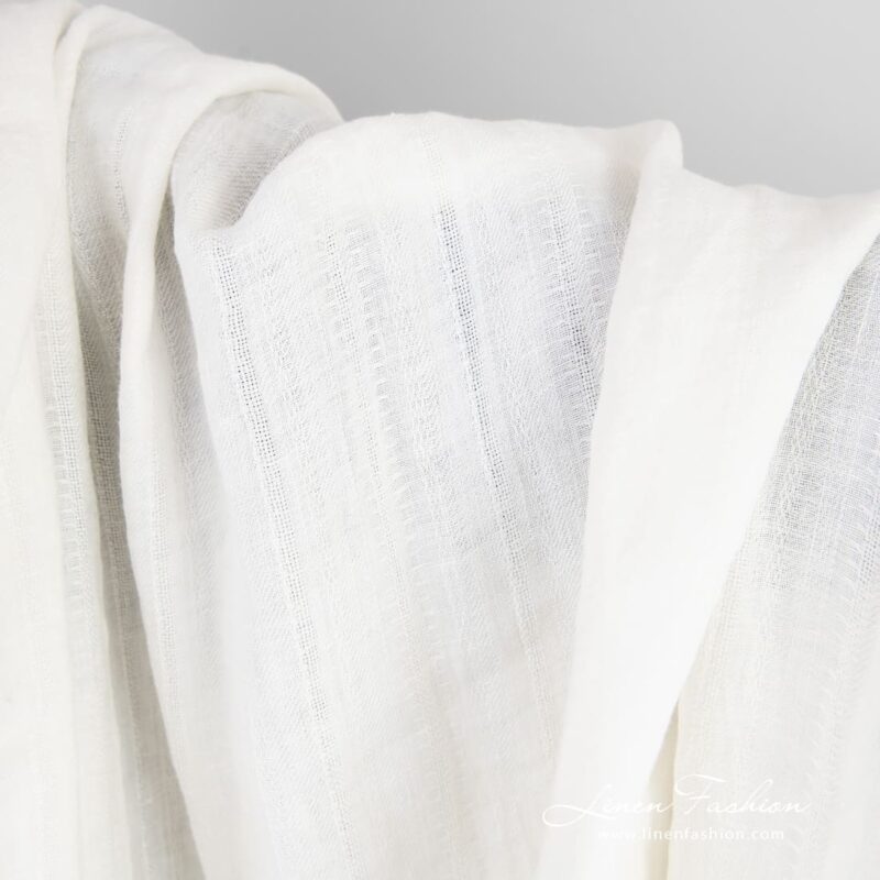 Off-white linen fabric with delicate stripes