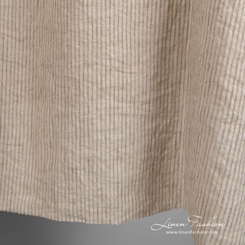 Linen fabric in light cocoa color, with vertical stripes