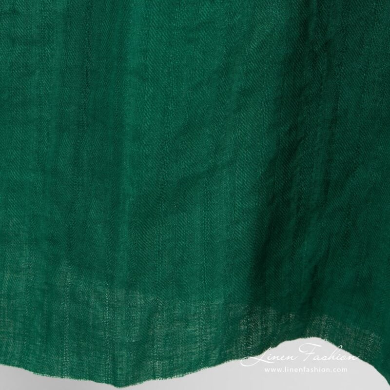 Green linen fabric in twills, specially washed to increase softness
