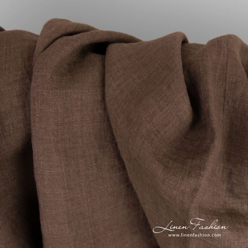 Linen fabric in green and violet melange, plain weave pattern