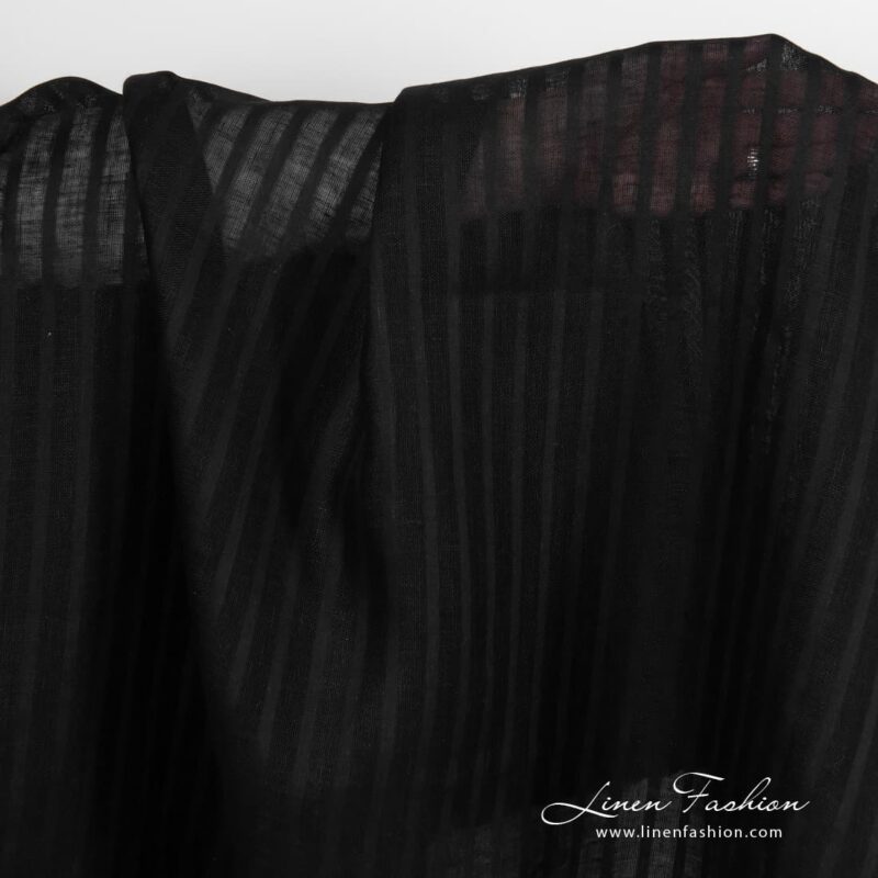 Lightweight black linen fabric.