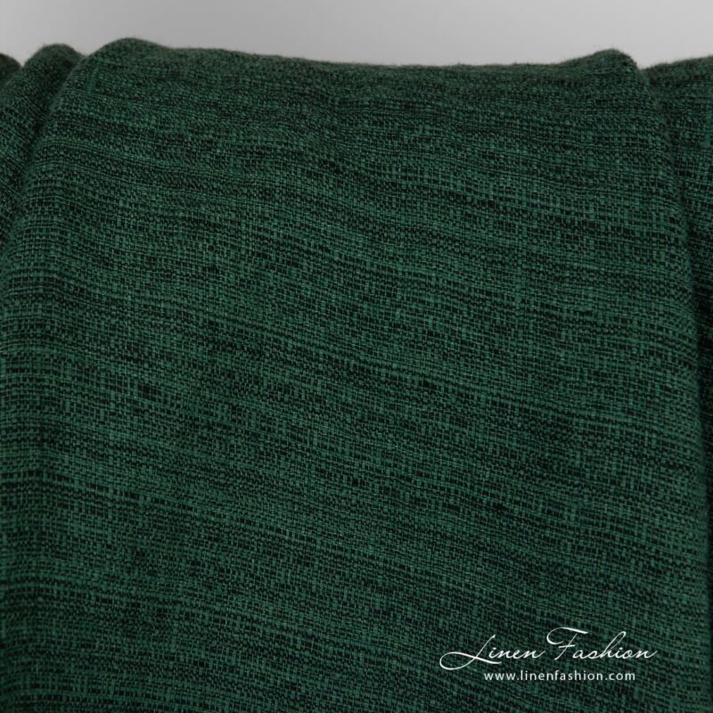 Forest green linen fabric in tweed pattern
