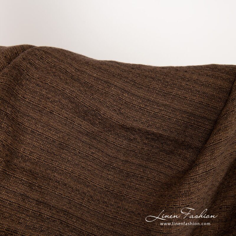 Brown linen fabric in tweed pattern, washed