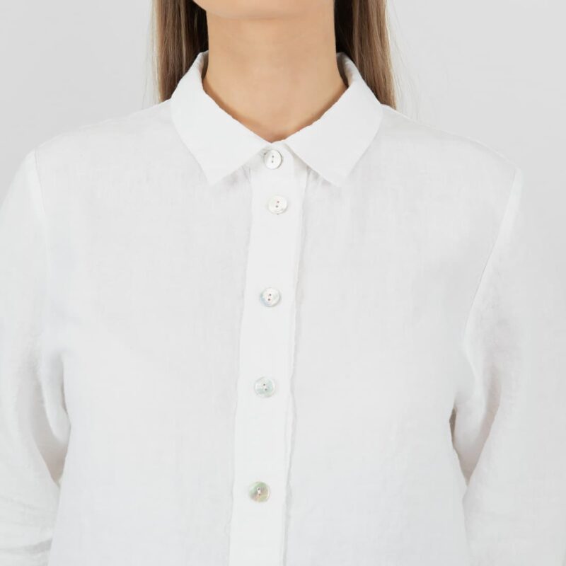 white linen shirt style blouse with button closure