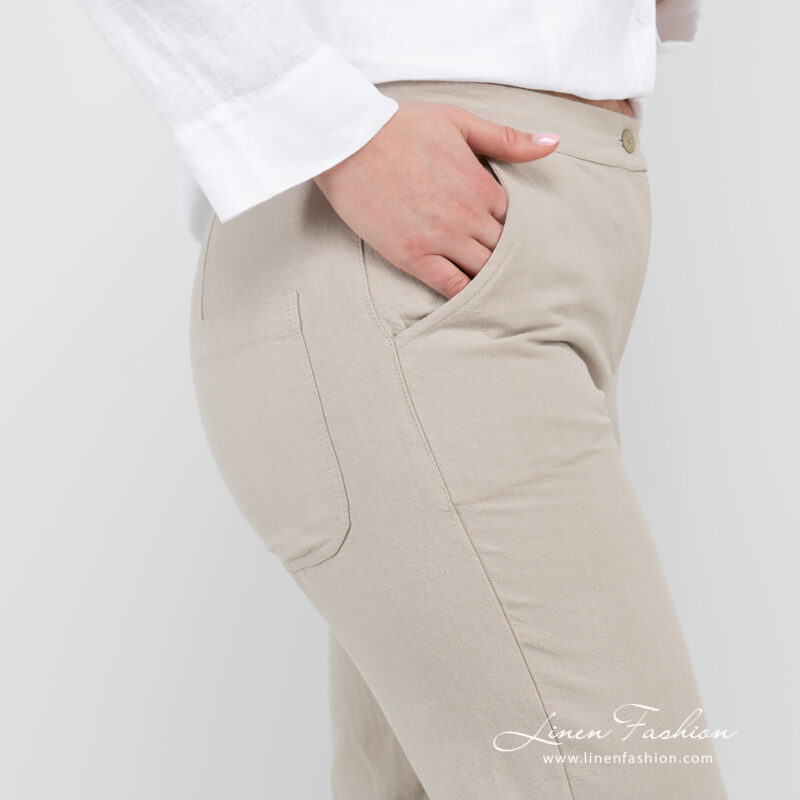 linen cotton beige pants jeans with pockets on back.