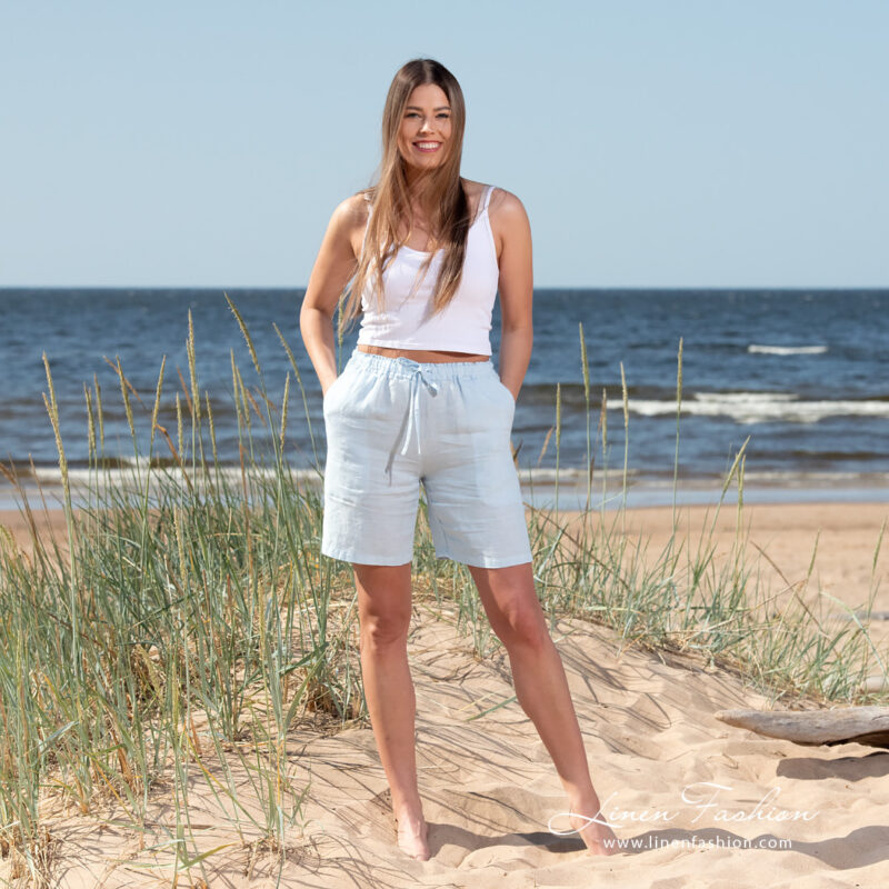 light blue linen shorts in full view.