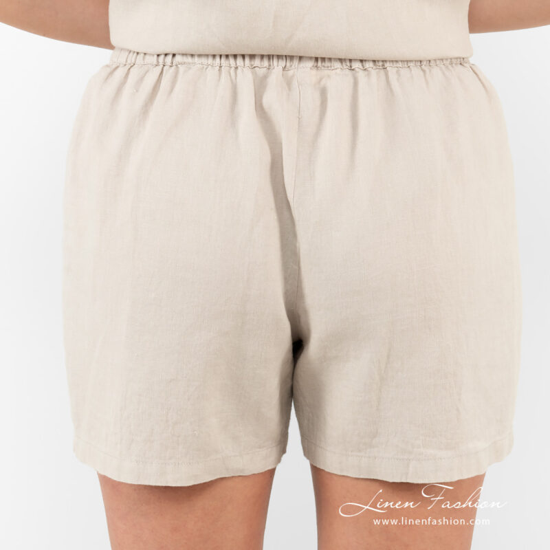 beige linen shorts from back side.