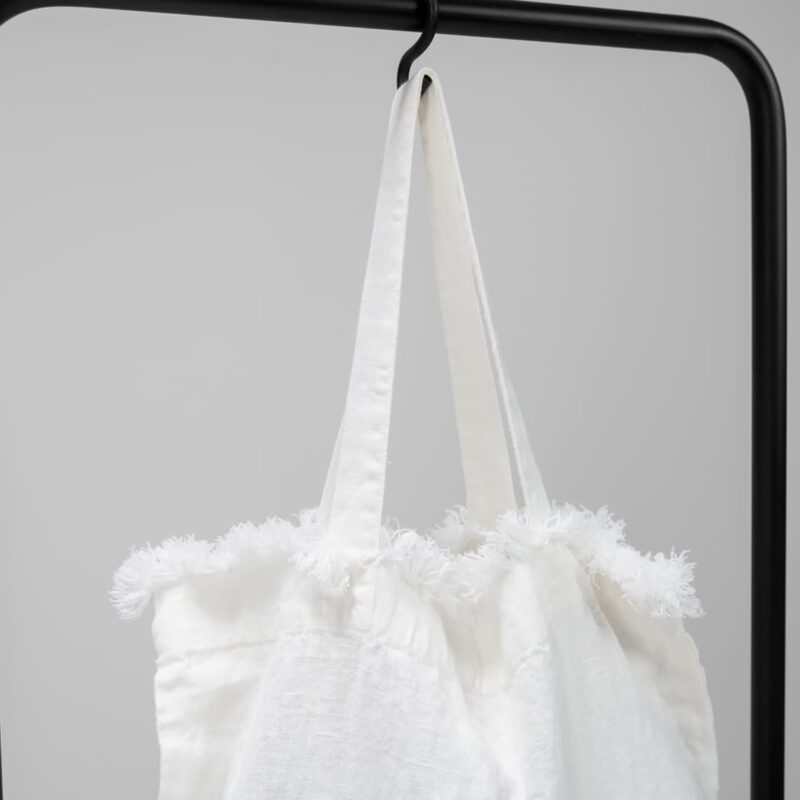 white washed linen bag with fringes