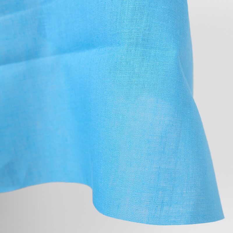 Linen fabric sky blue colour close up edge