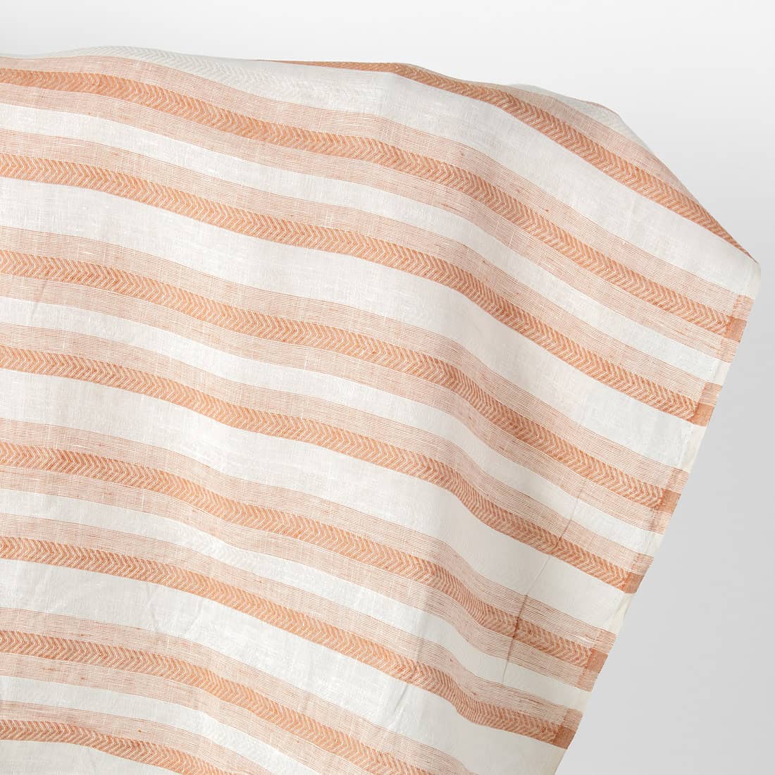 Linen fabric off-white and orange herringbone stripes
