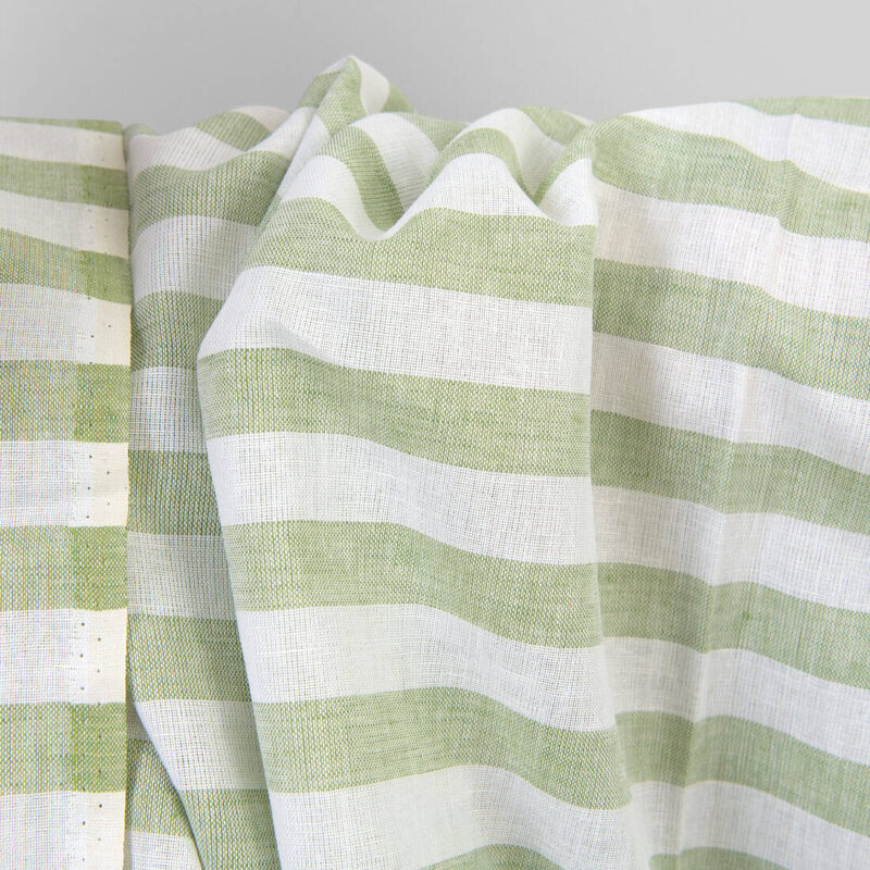 Linen cotton fabric in green and white stripes, unwashed