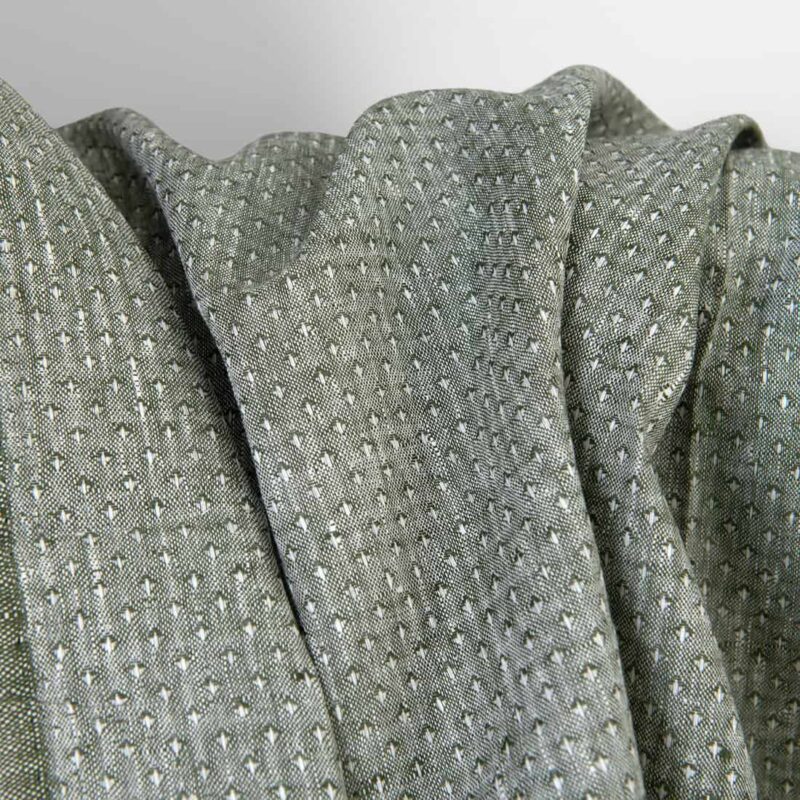 Linen fabric dark green with white dots, unwashed