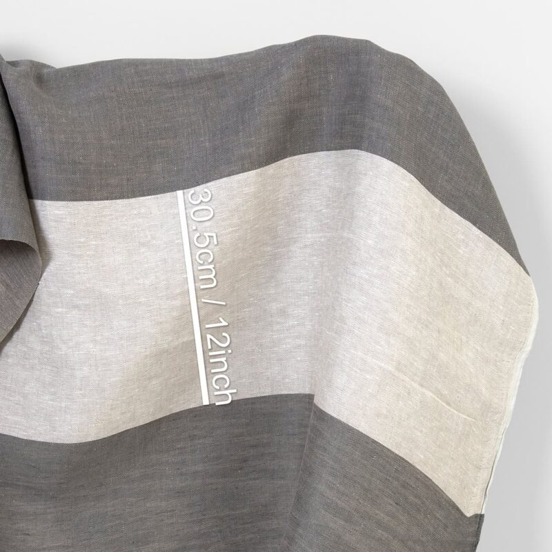 Linen fabric in grey and off-white stripes, sold by the meter